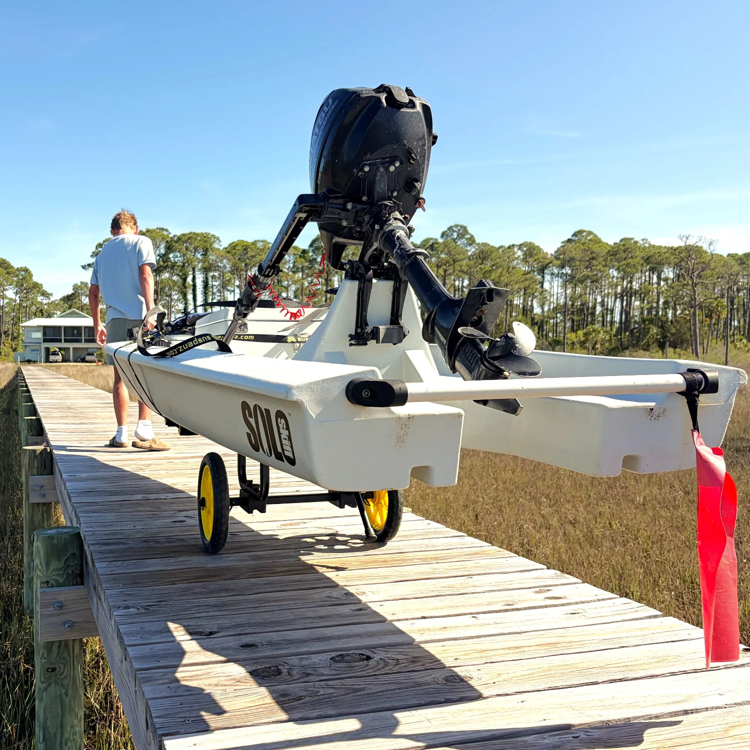 Kayak resting on a Suspenz padded storage rack